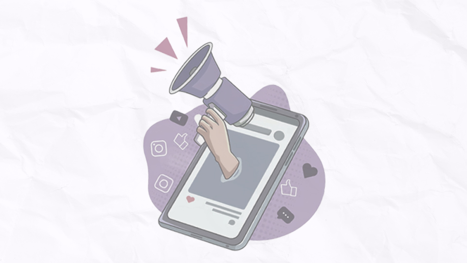 Mano con un megáfono saliendo de la pantalla de un celular.