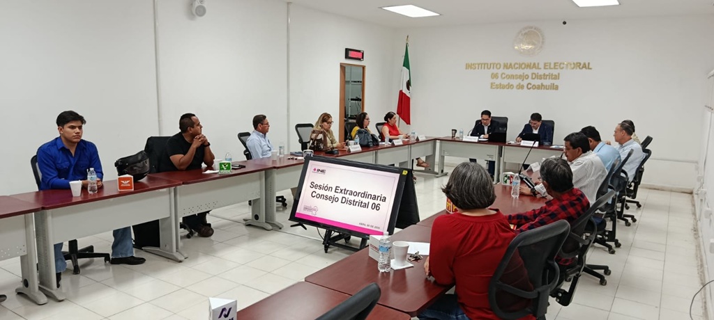 personas en una reunión de trabajo